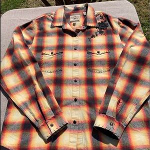 Plaid women’s rodeo/horse show shirt.